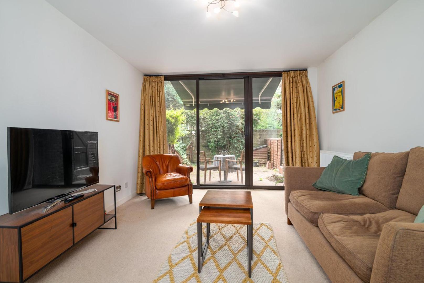 Ferienwohnung Guestready - Lovely Ground Floor Duplex With Patio In Southbank London Exterior foto
